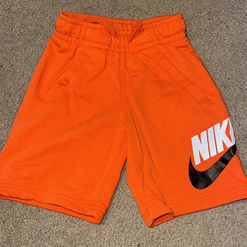 Orange Nike shorts